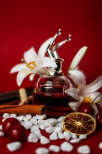A collection of luxurious fragrances including citrus and floral scents.